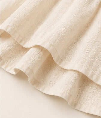Ivory Smocked Waist Ruffle Mini Skirt with Geometric Print