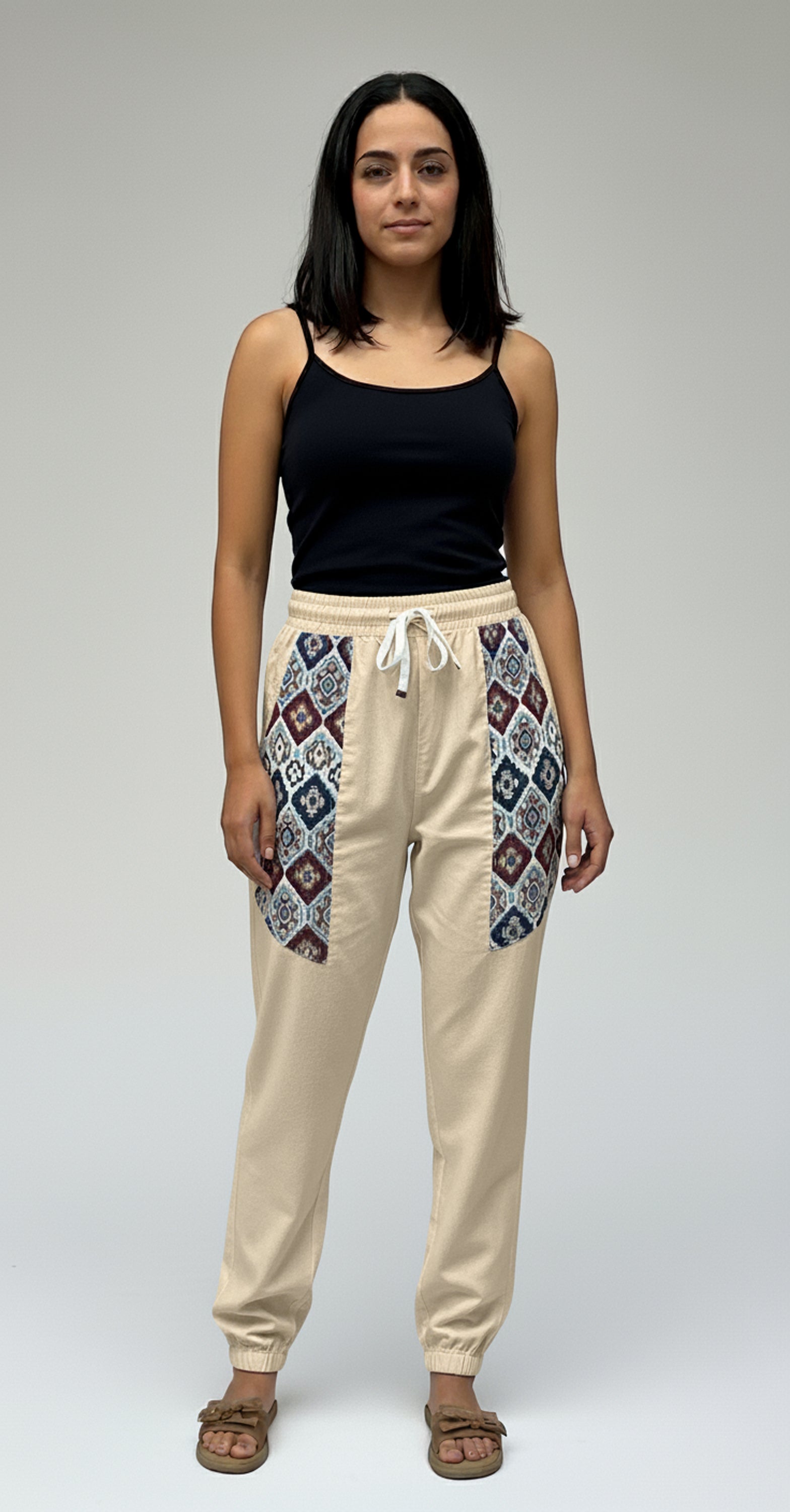 Beige cotton hopper pants for women with diamond motif, elastic drawstring waist and gathered ankles